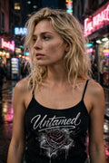 Women's black spaghetti-strap tank with a front-only print: the word 'Untamed' in flowing silver cursive script above a graffiti-style rose with thorns in dark red and silver.